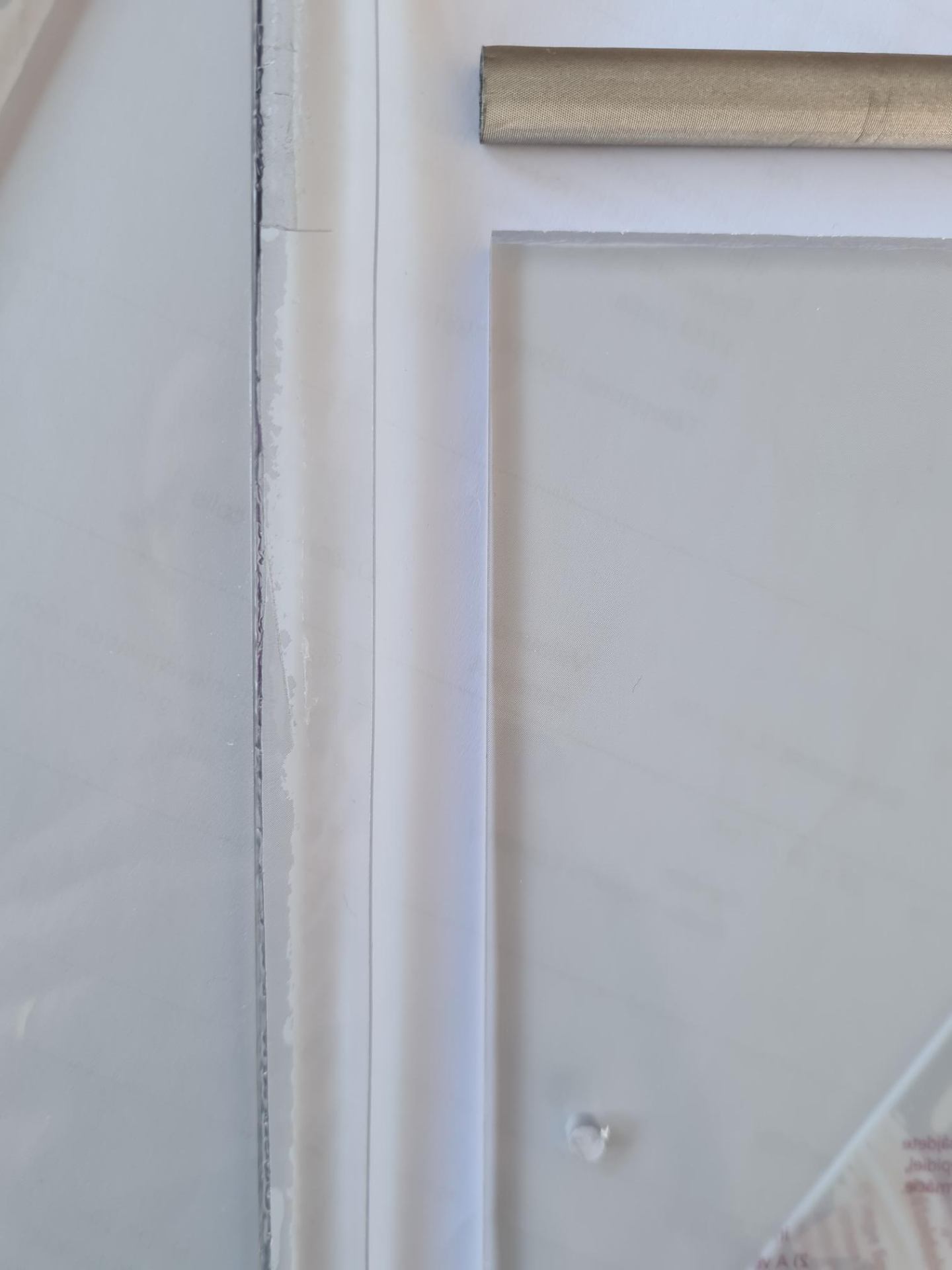 EMI shielding film integration on a window with gasket visible